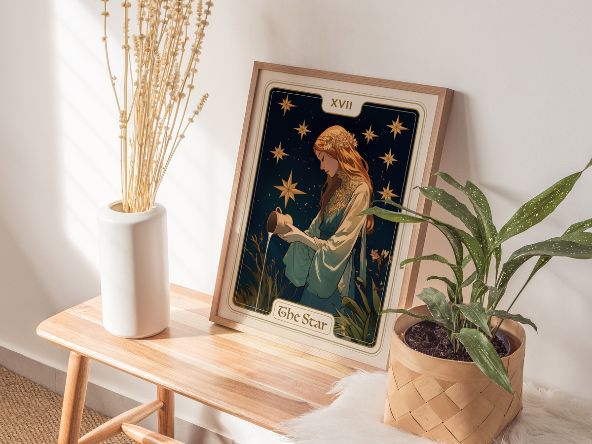 A framed illustration titled The Star depicts a woman with long, flowing hair seated in a serene pose, surrounded by twinkling stars.