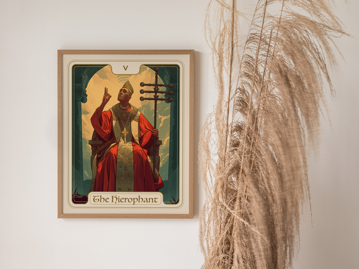 A framed illustration of The Hierophant, featuring a seated figure in red robes adorned with gold details, holding a staff and gesturing with one hand.