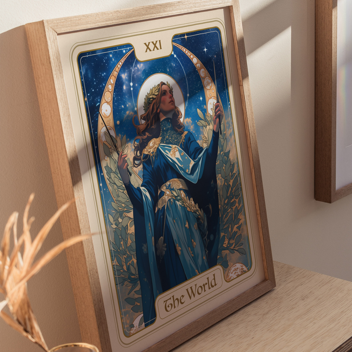 A beautifully illustrated tarot card titled The World, featuring a serene figure in a flowing blue gown adorned with gold accents.