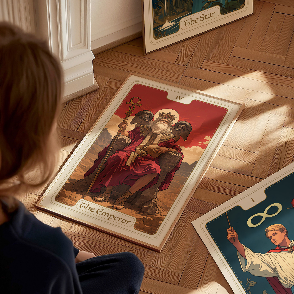 A child sits on a wooden floor, gazing at a large tarot card depicting The Emperor, featuring a regal figure with a crown and scepter, surrounded by mountains and a red sky.